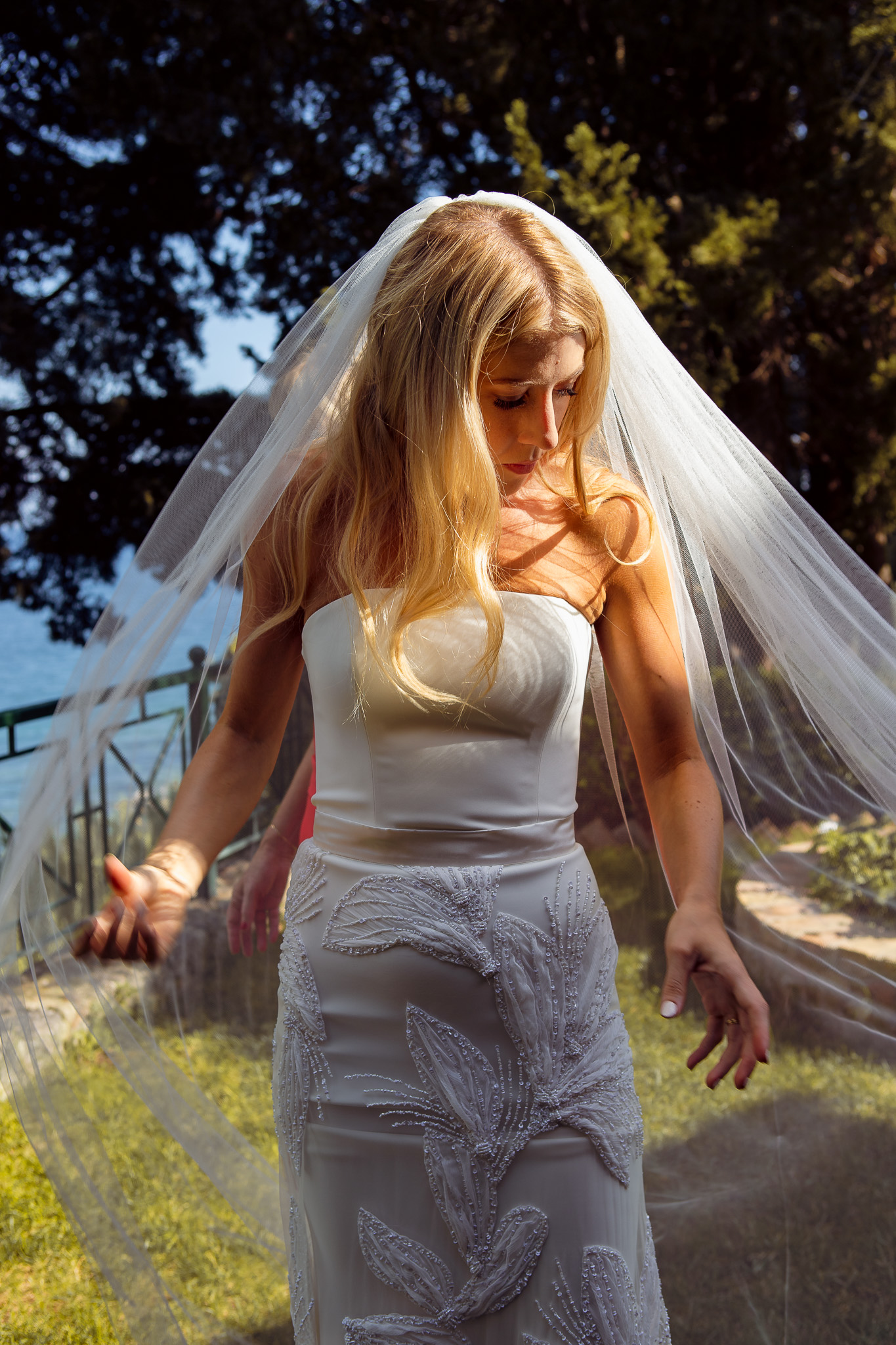 Alice poses in her wedding dress and veil at her villa in Crete before heading to her wedding.