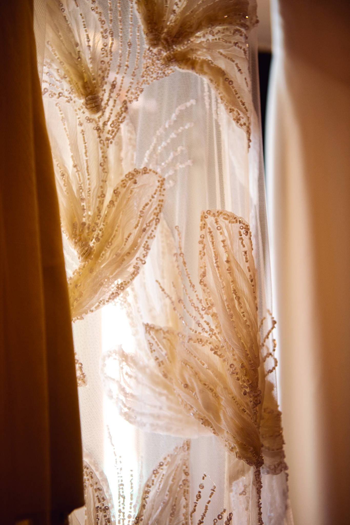 Close-up detail of a beautifully embroidered Halpenny London wedding skirt.