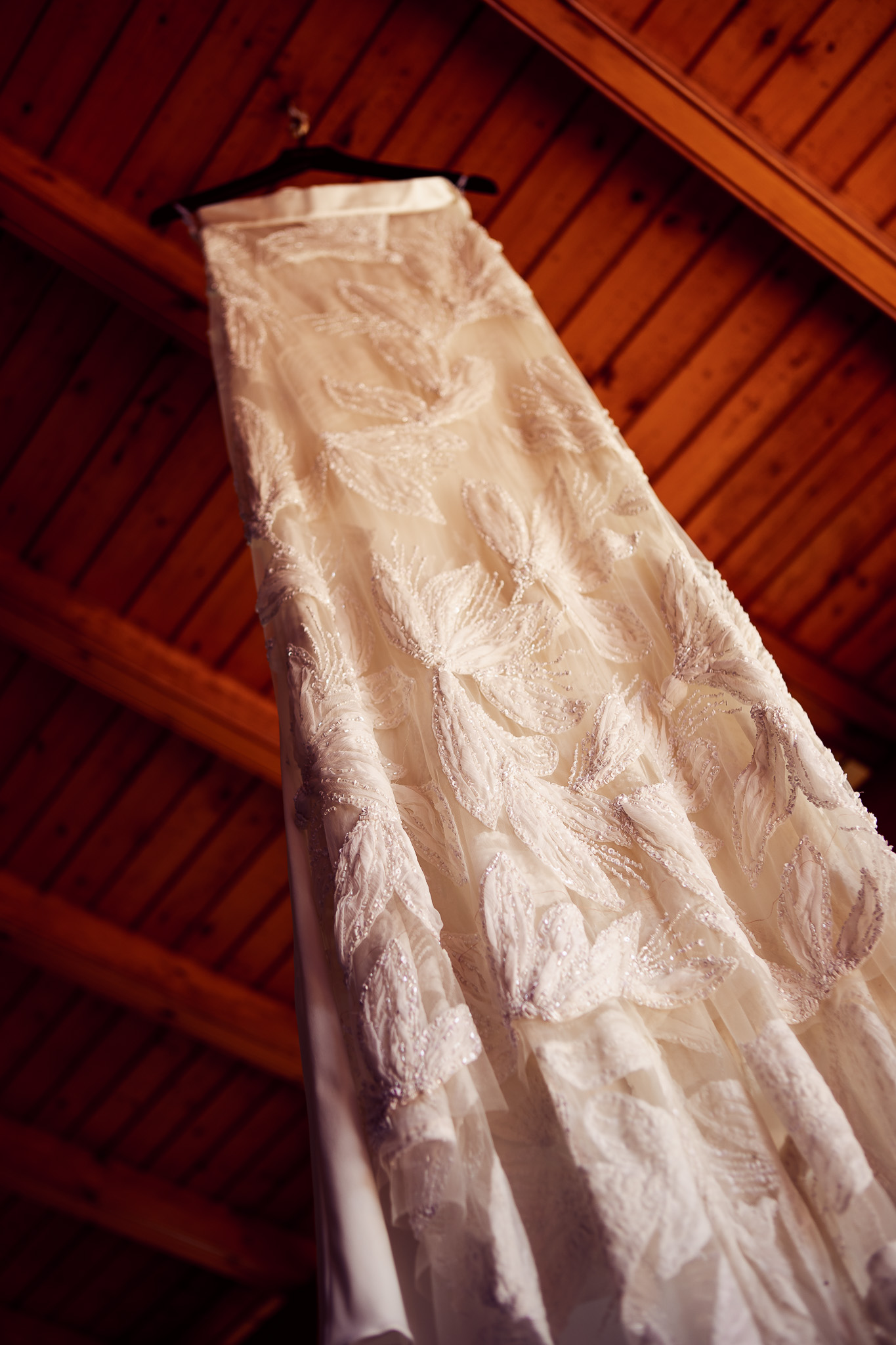 A Halfpenny wedding skirt hanging up from a ceiling.