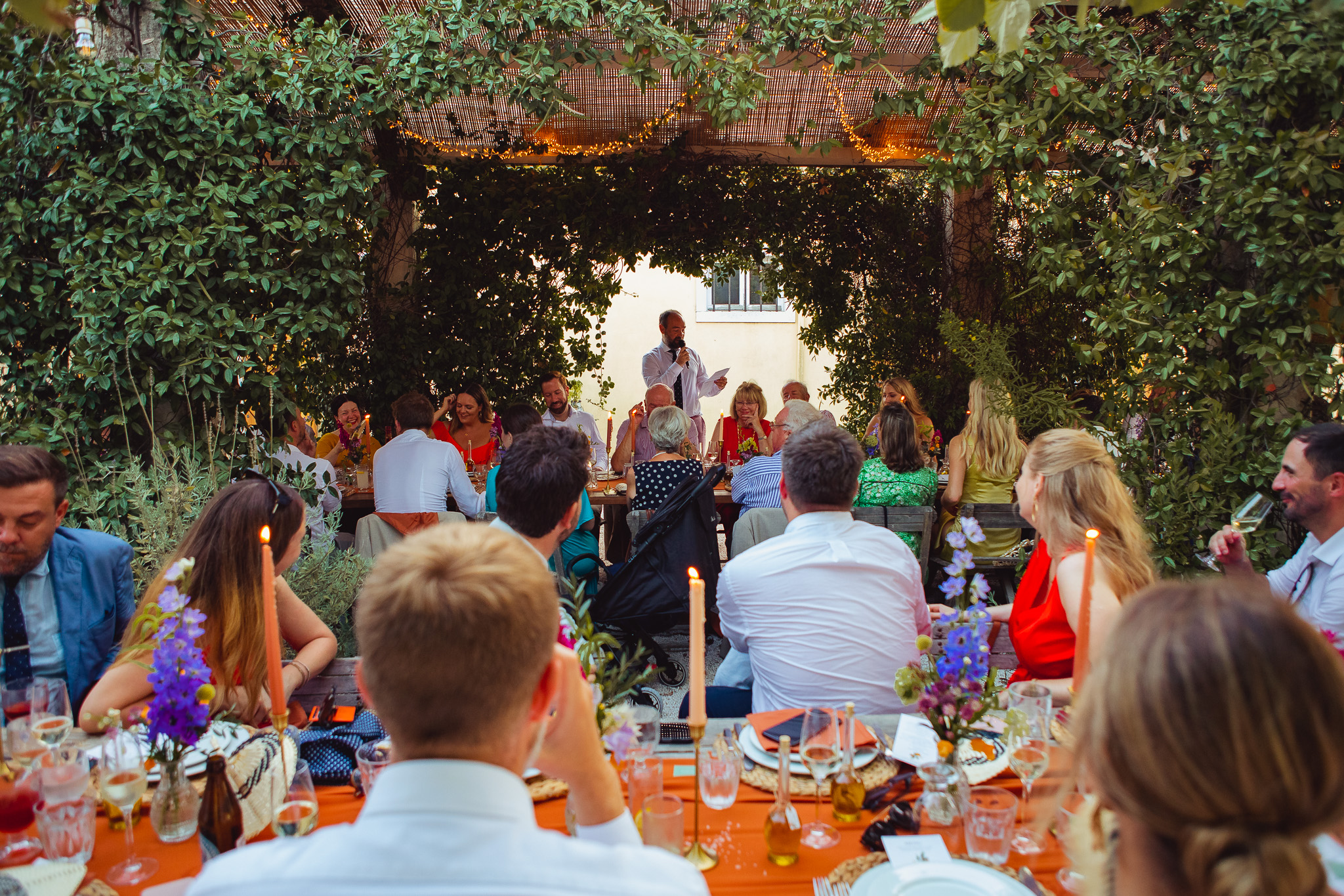 The groom delivers his speech whilst guests listen at Ambelonas Vineyard, Corfu