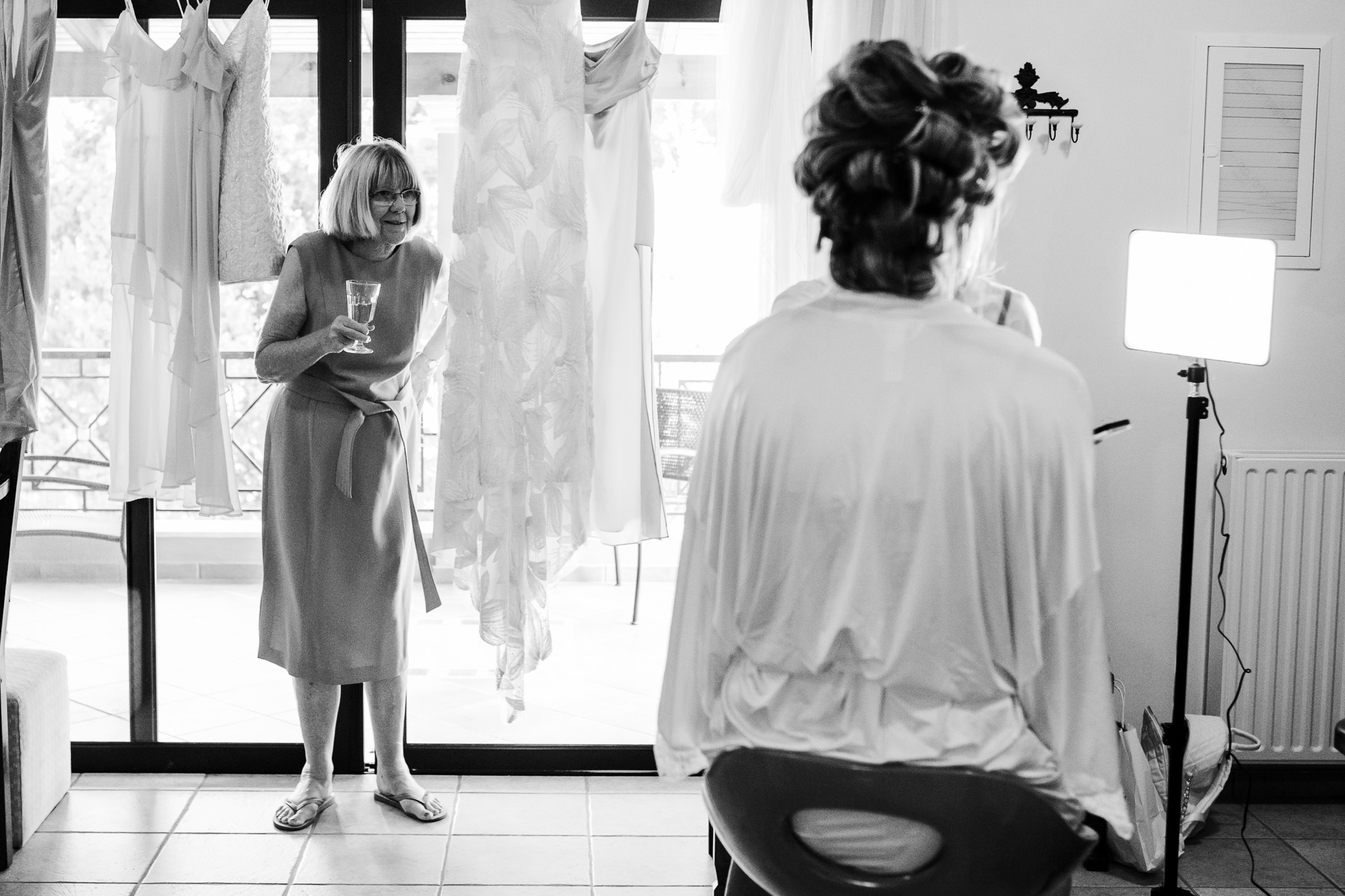 Alice's mum comes through the sliding doors and see's her daughter getting ready for her wedding day.