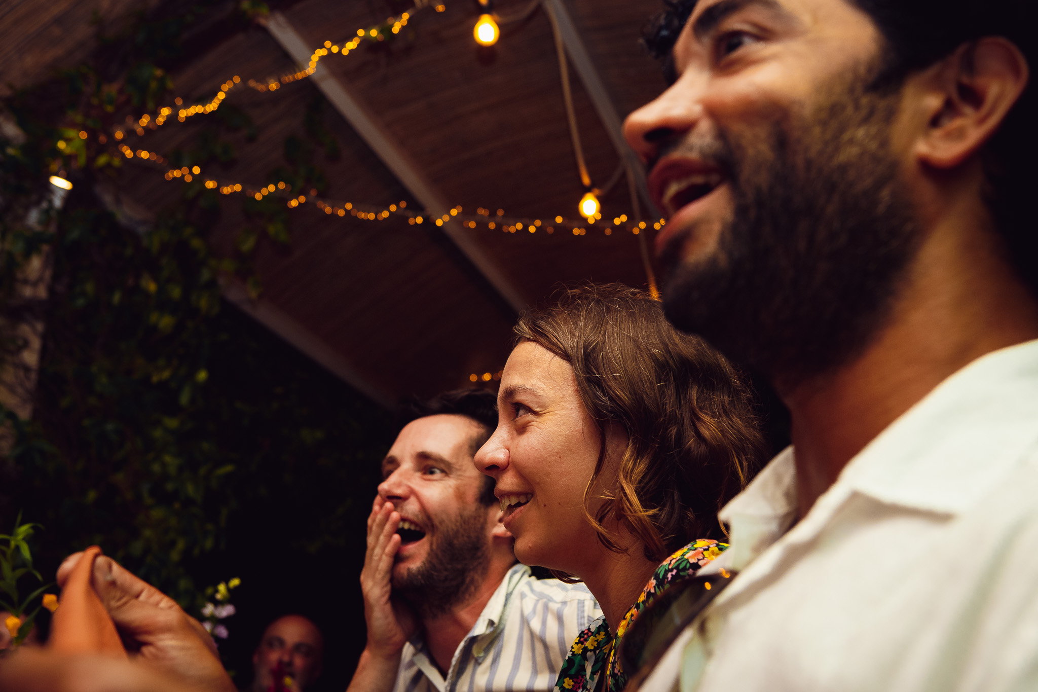 Guests gasp whilst listening to the best man speech at Ambelonas Vineyard, Corfu