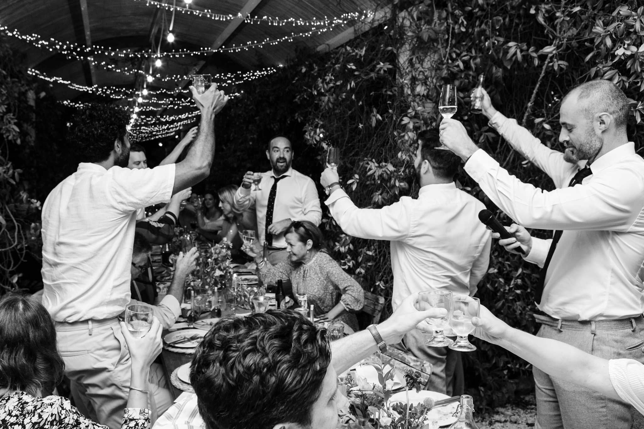 Guests toast groom after best man speech at Ambelonas Vineyard, Corfu