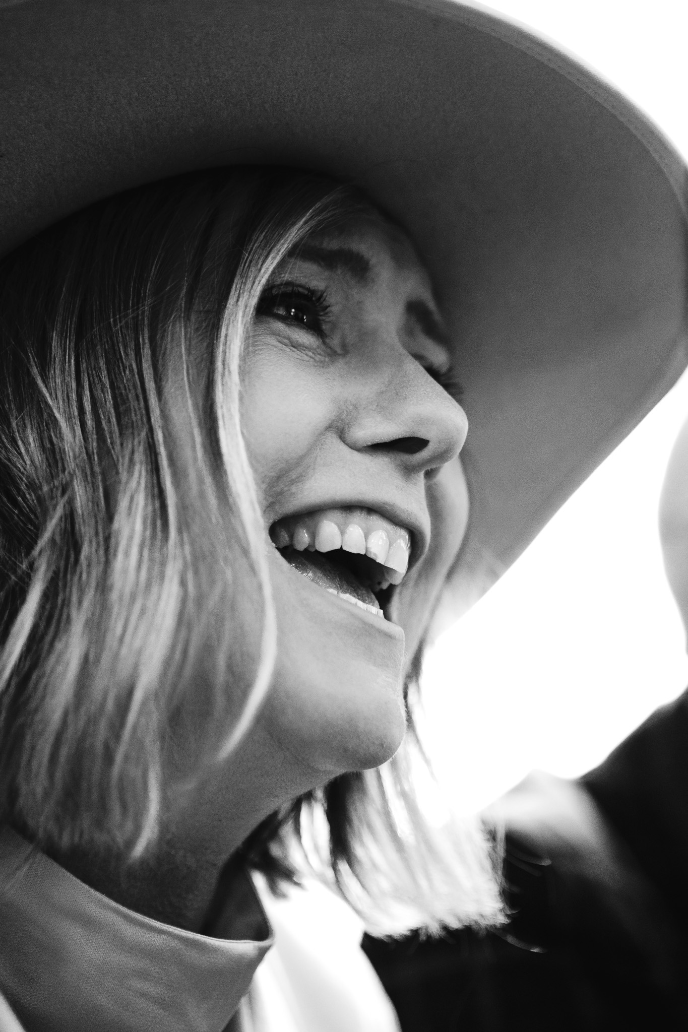 Mary laughs happily after her wedding ceremony.