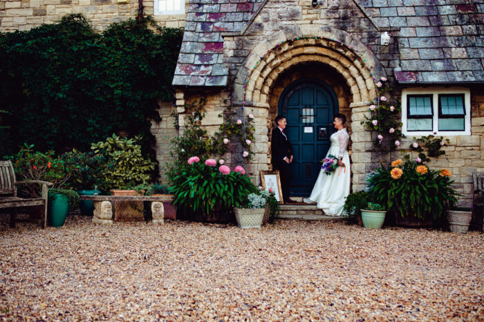 florence house wedding photographer lgbtq couple in doorway
