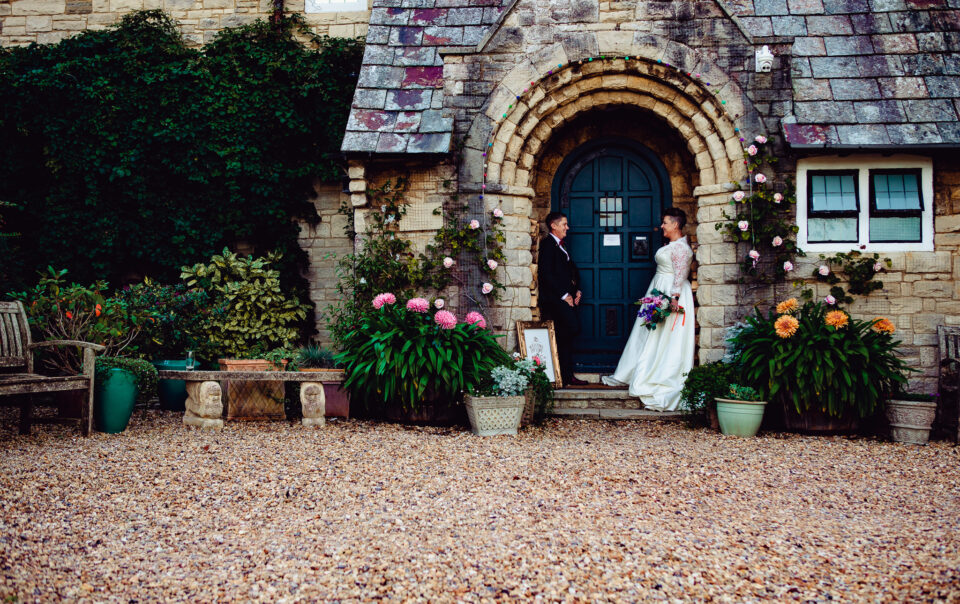 florence house wedding photographer lgbtq couple in doorway